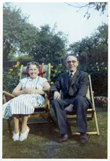 Images Dated 4th February 2021: A jolly older couple in a neat suburban back garden