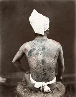 Jpan, man with extensive ornate tattoo, tattooing