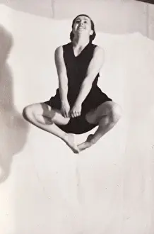 Jump against backdrop lit photo