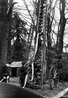 Practise Prints: Junior LFB firefighters practise on a Wheeled Escape Ladder