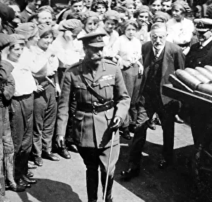 Holmes Collection: King George V with munitions workers at Holmes