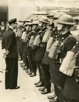 Inspects Prints: King George VI inspecting firefighters on parade, WW2
