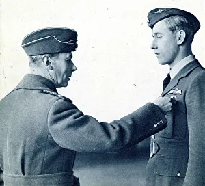 Pins Prints: King George VI pins DFC on pilot officer, WW2
