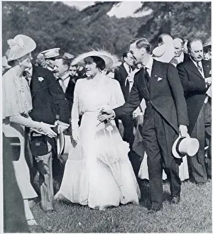 Hartnell Prints: King George VI and Queen Elizabeth greeting a guest at a garden party held in their honour at the Bagatelle in the Bois