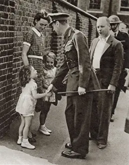Shaking Prints: King George VI's visit to the bomb-shattered East End of London in September 1940