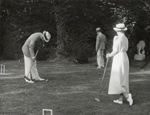 Mallet Prints: King Gustav V of Sweden plays his nation's favourite sport, croquet. Date: 1930s