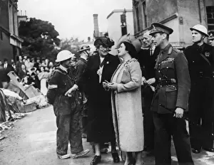 King and Queen with ARP wardens in London