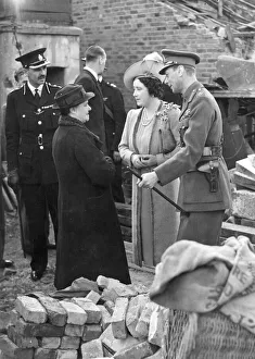 Bombed Gallery: King and Queen tour West London raid damage