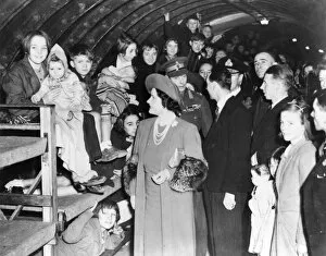 King and Queen visiting children in Underground shelters