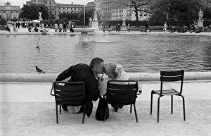 Kissing couple in a park, Paris, France