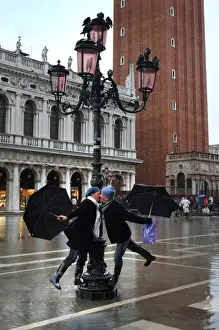 Flood Prints: Kissing in the rain - St Marks, Venice