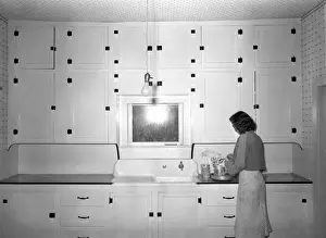 Kitchen Prints: Kitchen of tenant purchase client. Hidalgo County, Texas