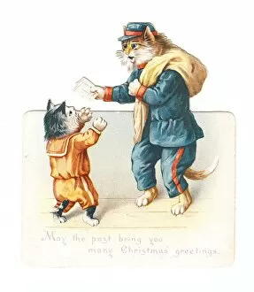 Kitten with cat postman on a cutout Christmas card
