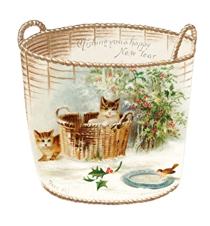 Two kittens with basket on a Christmas card