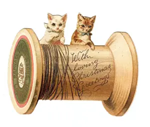 Bobbin Prints: Two kittens with cotton reel on a cutout Christmas card