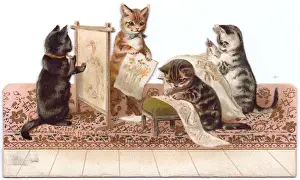 Four kittens on a cutout greetings card
