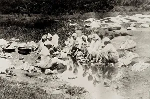 Korea: washing clothes in a river