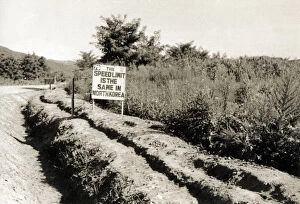Signage Collection: Korean War era - Speed Limit sign close to the 38th parallel north, which formed the