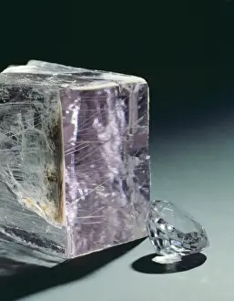 Kunzite crystal and cut stone