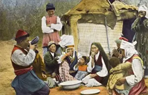 Extended Prints: Kyrgyzstan - Extended family group eating a meal