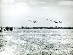 Towed Prints: L. C. Marmol in a Lunak L107 sailplane, G-ALSI, is towed ?