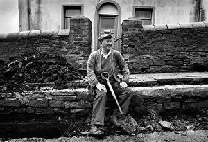 Labourer Mr Idris Silman takes a break, Tredegar, Wales