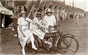 Horn Collection: Three ladies on a 1908 Phelon & Moore motorcycle