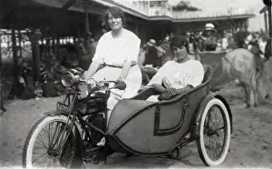 Charm Prints: Two ladies on a 1914 Triumph motorcycle & sidecar