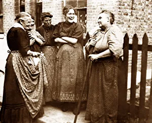 Gossips Prints: Ladies chatting by the fence, early 1900s