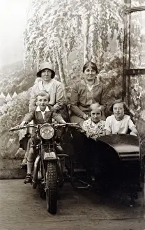Staring Prints: Ladies and children on a 1929 Coventry Eagle motorcycle & si
