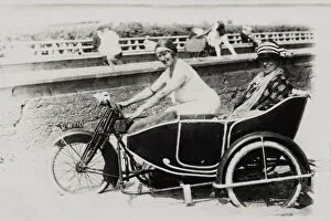 Forks Gallery: Two ladies on an early 1900s AJS motorcycle & sidecar