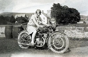 Sunbeam Collection: Lady on a 1921 Sunbeam motorcycle