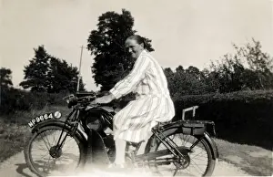 Lady on 1926 Royal Enfield motorcycle