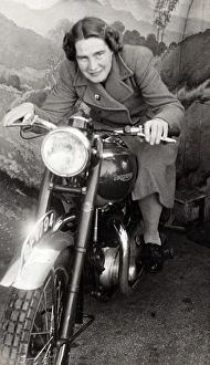 Triumph Gallery: Lady on a 1948 Triumph motorcycle