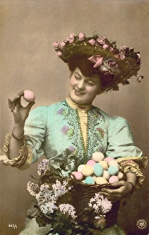 Easter Collection: Lady with a basket full of decorated Easter eggs