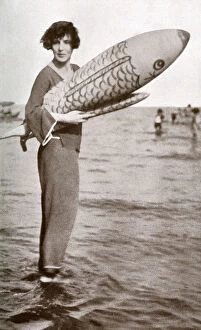 Lady Diana Cooper at Venice Lido with inflatable fish