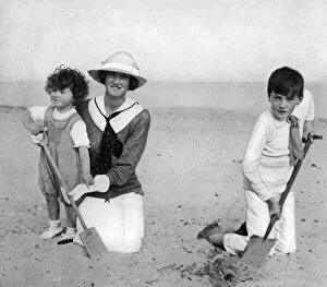 Lady Evelyn Guinness with her children on the beach, WW1