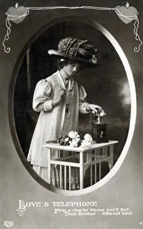 Images Dated 15th December 2020: A Lady excited by the ring of Loves Telephone