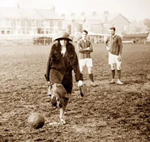 Kicking Prints: A lady kicking a football, early 1900s