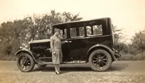 Lady and motor car