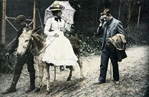 Exhausted Collection: Lady riding side-saddle on a donkey