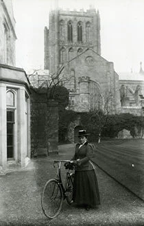 Boater Gallery: Lady with safety bicycle, Hereford Cathedral