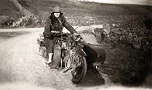Sunbeam Collection: Lady sitting on 1920 Sunbeam 500 motorcycle