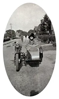 Nineteen Prints: Lady sitting in veteran 1920s motorcycle sidecar