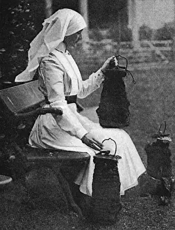 Marchioness Prints: Lady Stradbroke posed with bombs dropped on Henham Hall, WW1