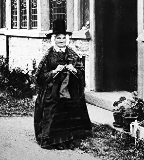 Lady in traditional dress in Tan-y-Bwlch, Wales