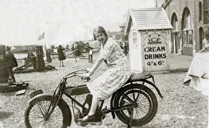 Prop Collection: Lady on vintage motorcycle at the seaside