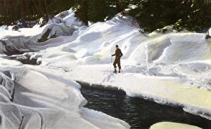 Adirondack Gallery: Lake Placid, N.Y. USA - Skier pauses by Winter Brook