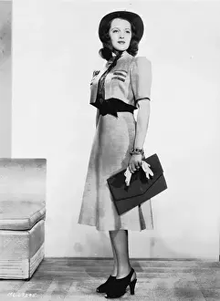 Ensemble Prints: Lana Turner wearing two-piece frock designed by Dolly Tree