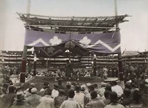 Arena Gallery: Large crowd watching sumo wrestling outdoor arena
